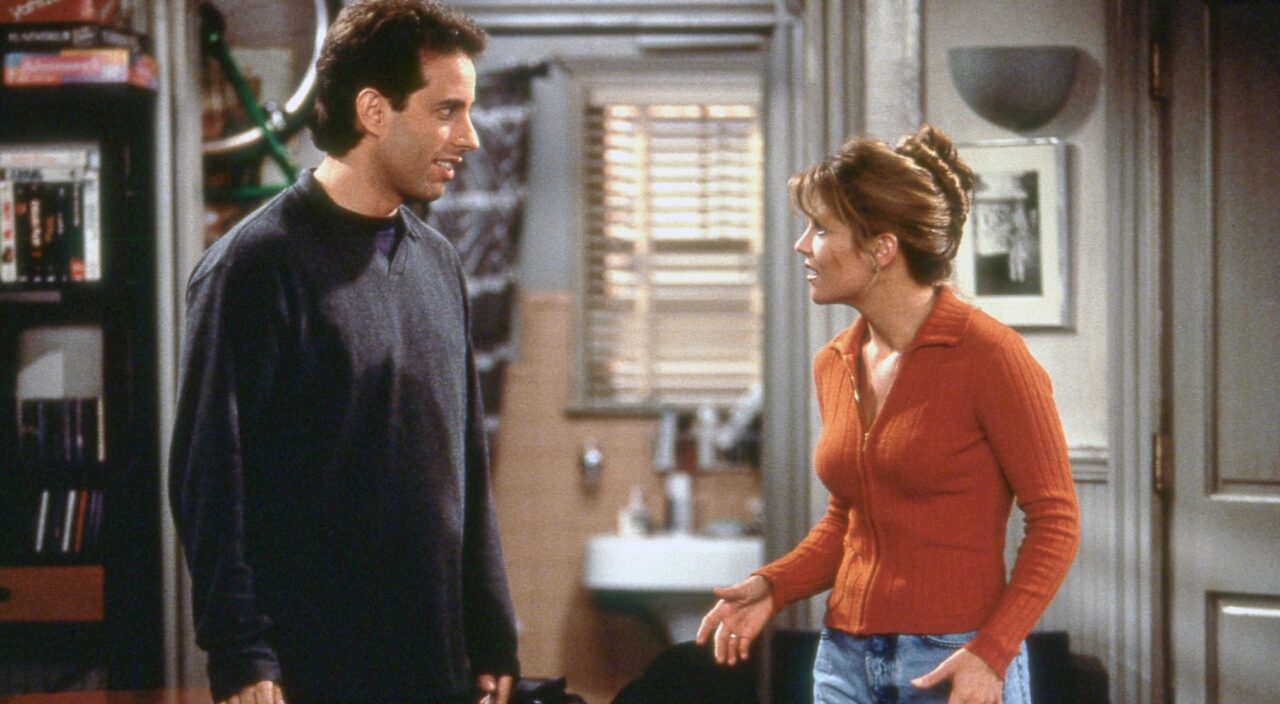 SEINFELD, from left: Jerry Seinfeld, A.J. Langer, ‘The Fatigues’, (Season 8, ep. 806, aired Oct 31, 1996). 1990-98. photo: photo: Carin Baer / ©Castle Rock Entertainment / Courtesy Everett Collection