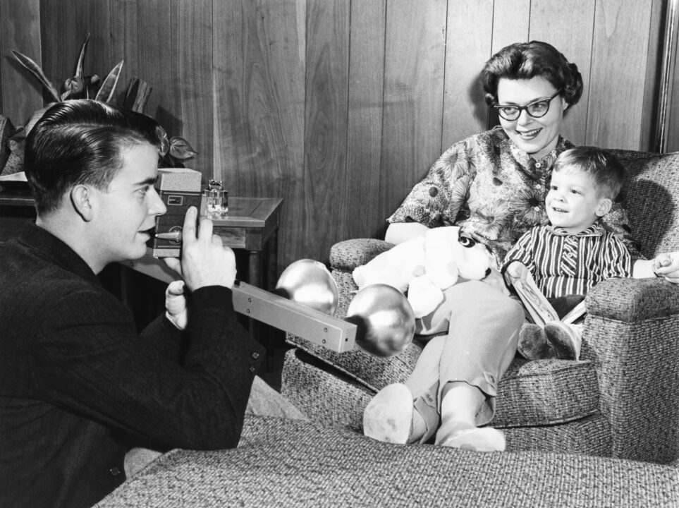 Dick Clark, left, filming his first wife, Barbara Clark, and their son, Dick Clark, Jr., (and his stuffed Morgan Dog) at their Drexel Hills, Pennsylvania, home, 1959