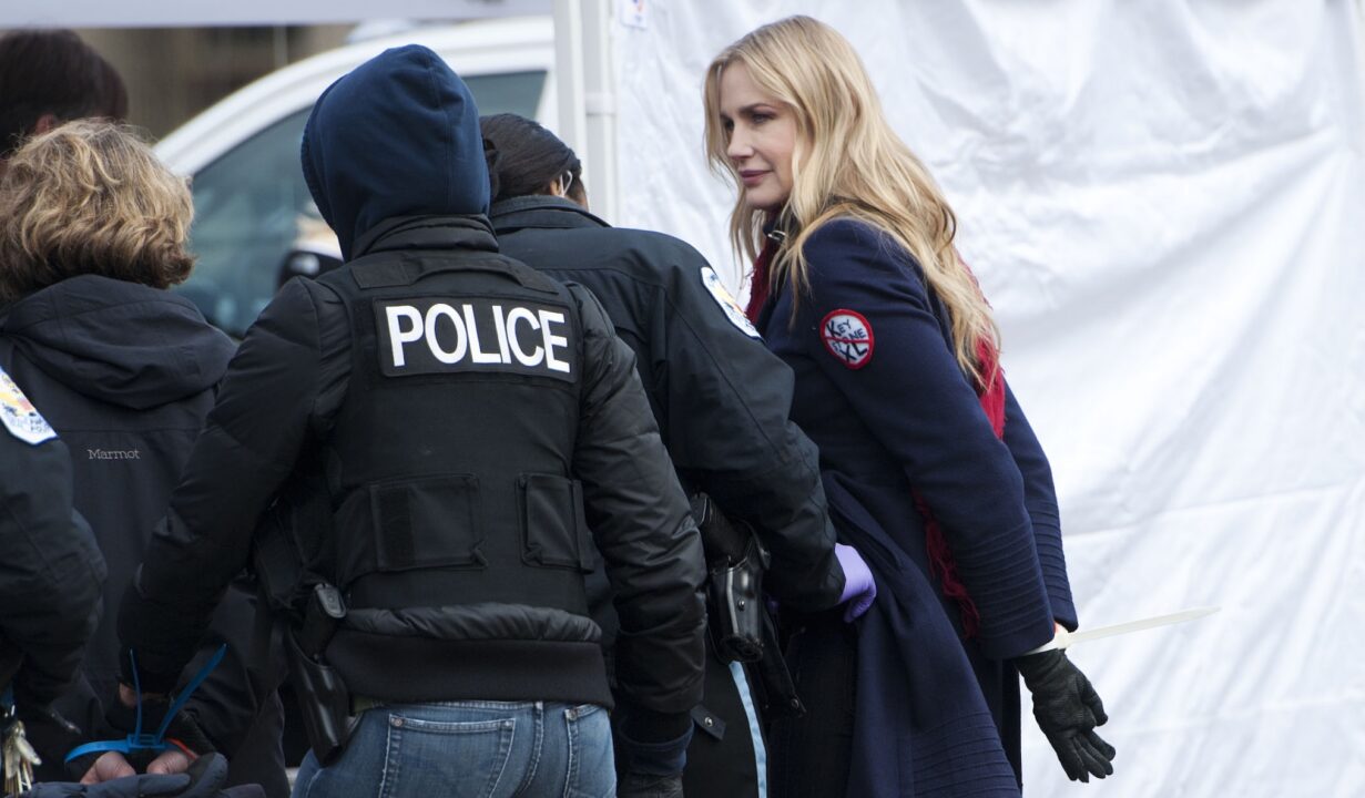 WASHINGTON, DC - FEBRUARY 13: Daryl Hannah is handcuffed and arrested during the Keystone XL Pipeline Protest at Lafayette Park on February 13, 2013 in Washington, DC. (Photo by Leigh Vogel/Getty Images)