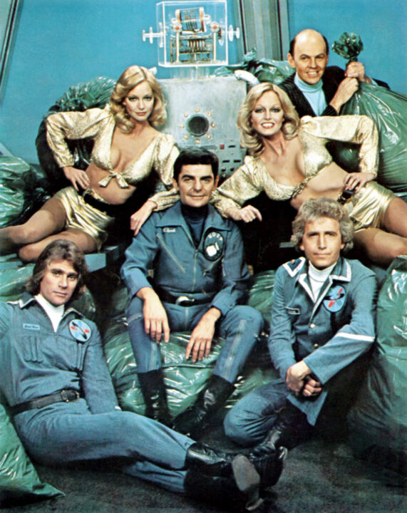 QUARK, bottom left: Tim Thomerson, center: Richard Benjamin, top right: Conrad Janis, Cyb/Patricia Barnstable (in gold lame), bottom right: Richard Kelton, 1977