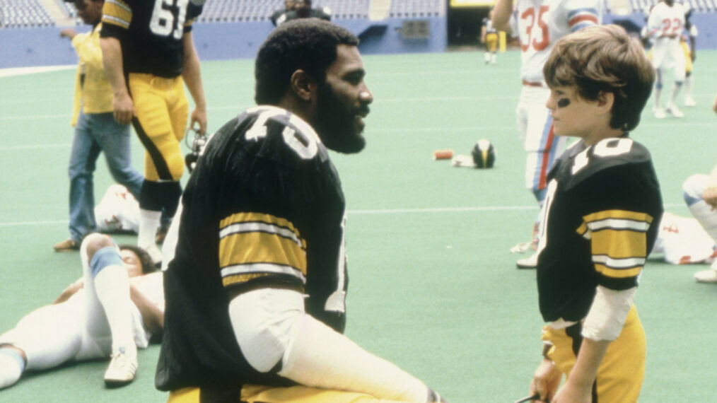 THE STEELER AND THE PITTSBURGH KID, (from left): 'Mean' Joe Greene, Henry Thomas, 1981
