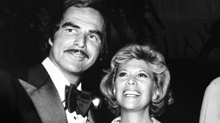From left, Burt Reynolds, Dinah Shore, at a roast for Hal Needham, 1975