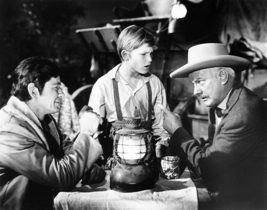 GUNS OF DIABLO, Charles Bronson (left), Kurt Russell (center), 1964