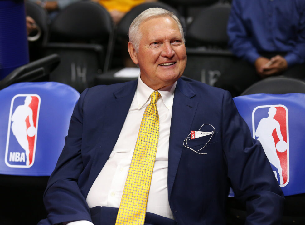 Golden State Warriors executive board member Jerry West sits on the bench by NBA logos before the game the Los Angeles Clippers at Staples Center on March 31, 2015 in Los Angeles, California. NOTE TO USER: User expressly acknowledges and agrees that, by downloading and or using this photograph, User is consenting to the terms and conditions of the Getty Images License Agreement.