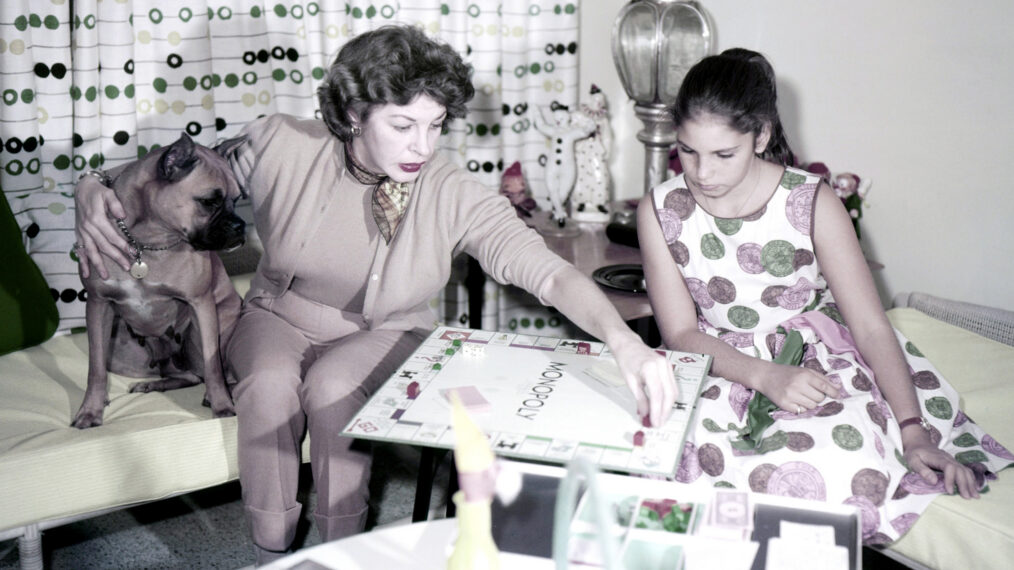 Martha Raye, playing Monopoly at home with her daughter, Melodye Condos, ca. early 1960s