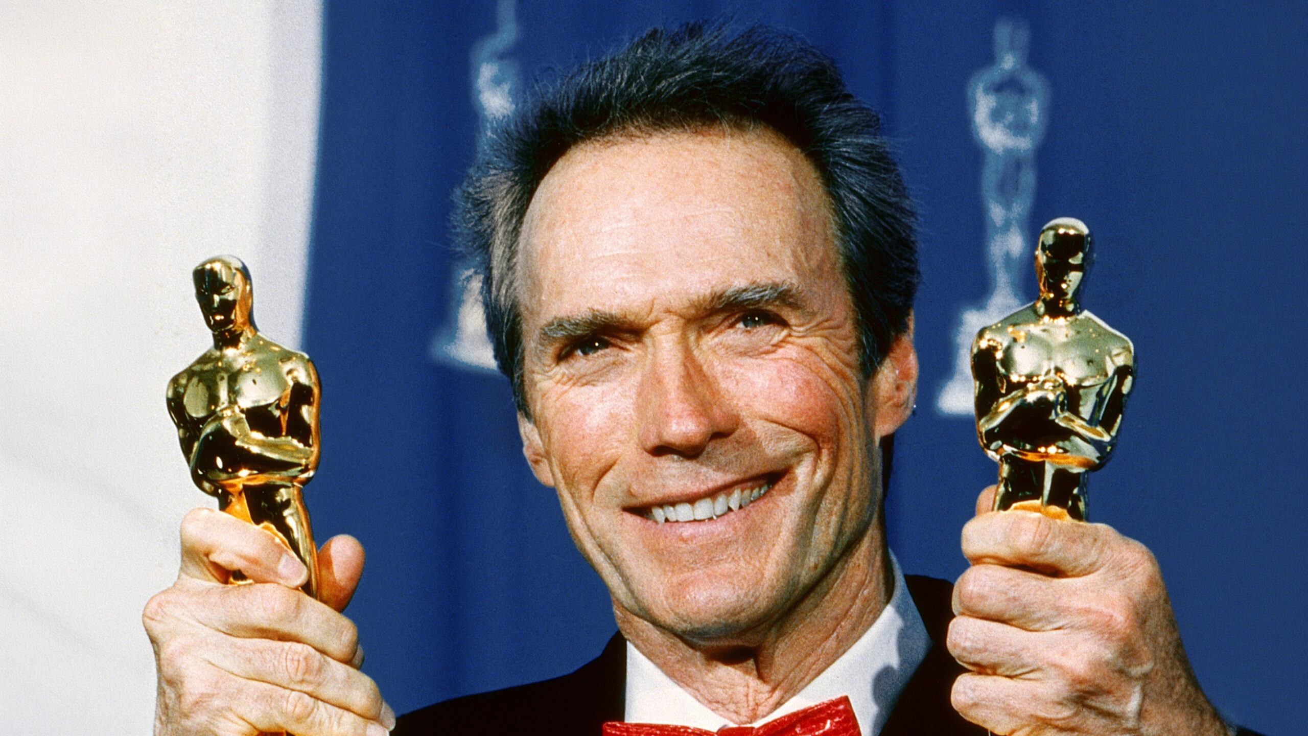 Clint Eastwood winning Academy Awards for Best Director and Best Actor for his film, UNFORGIVEN, 1993.