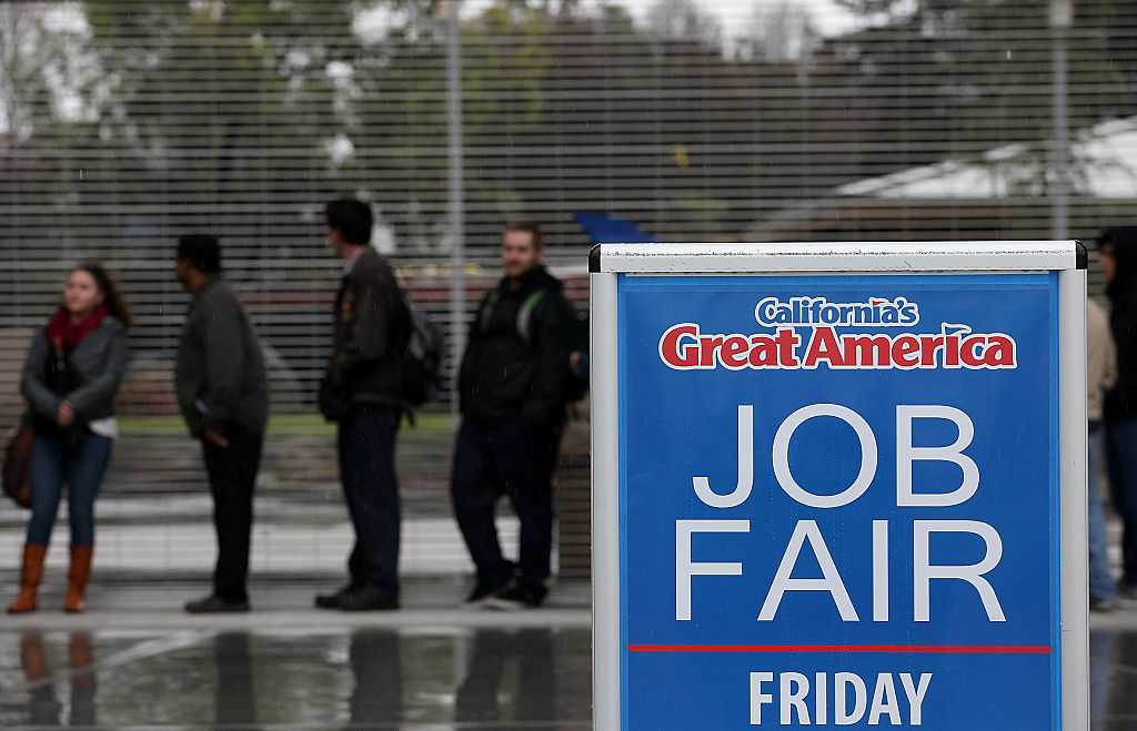 SANTA CLARA, CA - FEBRUARY 06: Job seekers wait in line to register for a job fair at California's Great America theme park on February 6, 2015 in Santa Clara, California. Hundreds of job seekers lined up to apply for one of the 2,500 jobs available at California's Great America theme park. According to the U.S. Labor Department, employers added 257,000 jobs in January and more than 1 million in the past three months, the biggest quarter since 1997