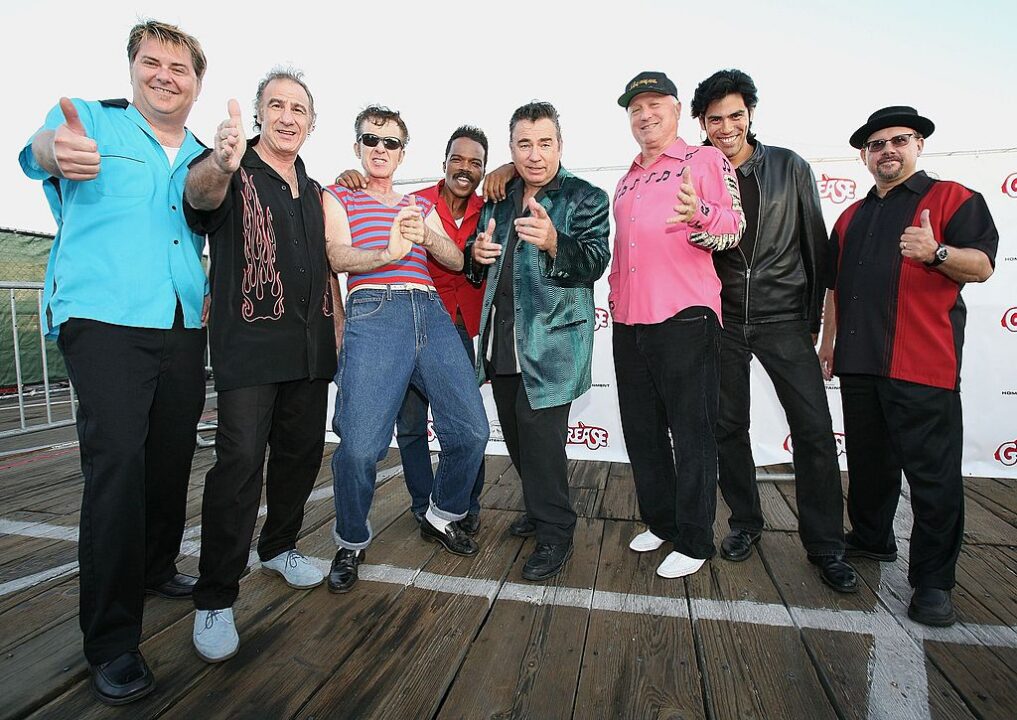 Musicians Tim Butler, Jay Leslie, Donny York, Reggie Battise, Jocko Marcellino, Screamin' Scott Simon, Gene Jaramillo and Paul Kimbarow of the band Sha Na Na attend the celebration of the DVD release of "Grease Rockin' Rydell Edition" at the Santa Monica Pier on September 19, 2006 in Santa Monica, California