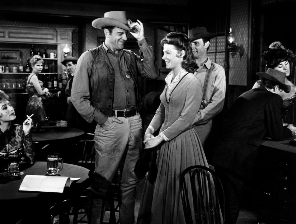GUNSMOKE, Amanda Blake (seated, far left), James Arness, Mariette Hartley, Dennis Weaver (ca. 1964), 1955-75