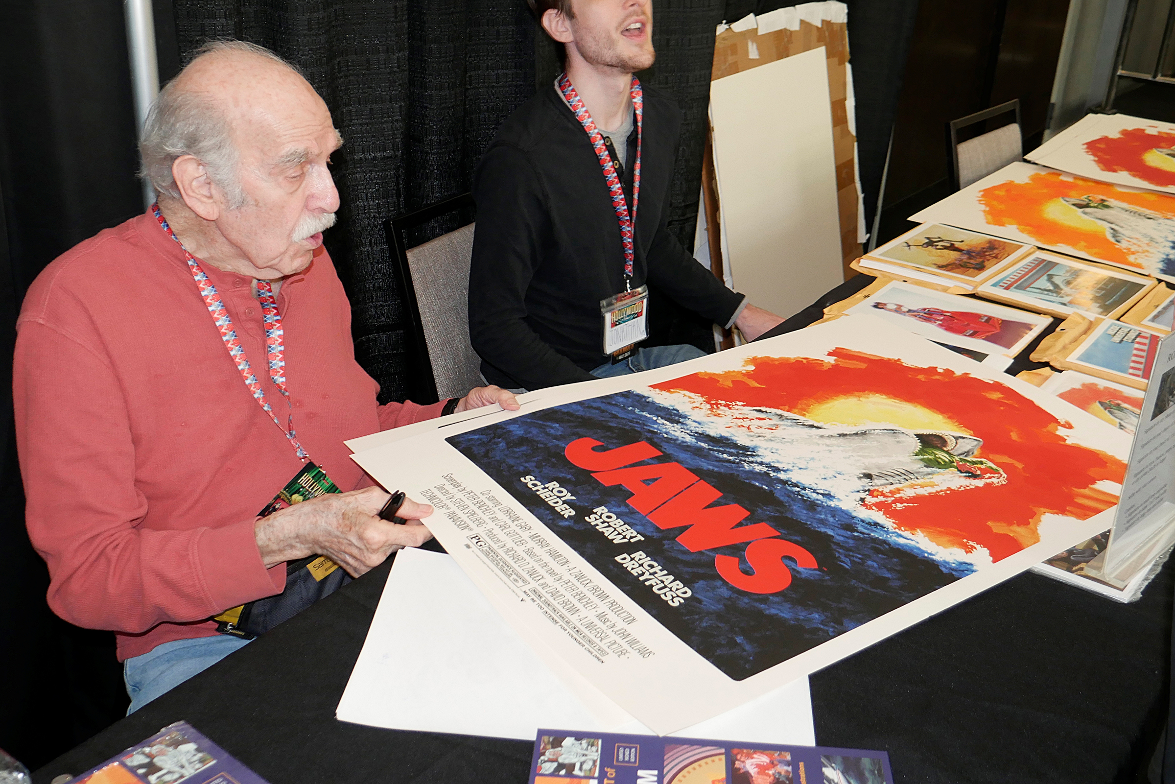 Robert Tanenbaum Poster Artist with Jaws poster at Hollywood show