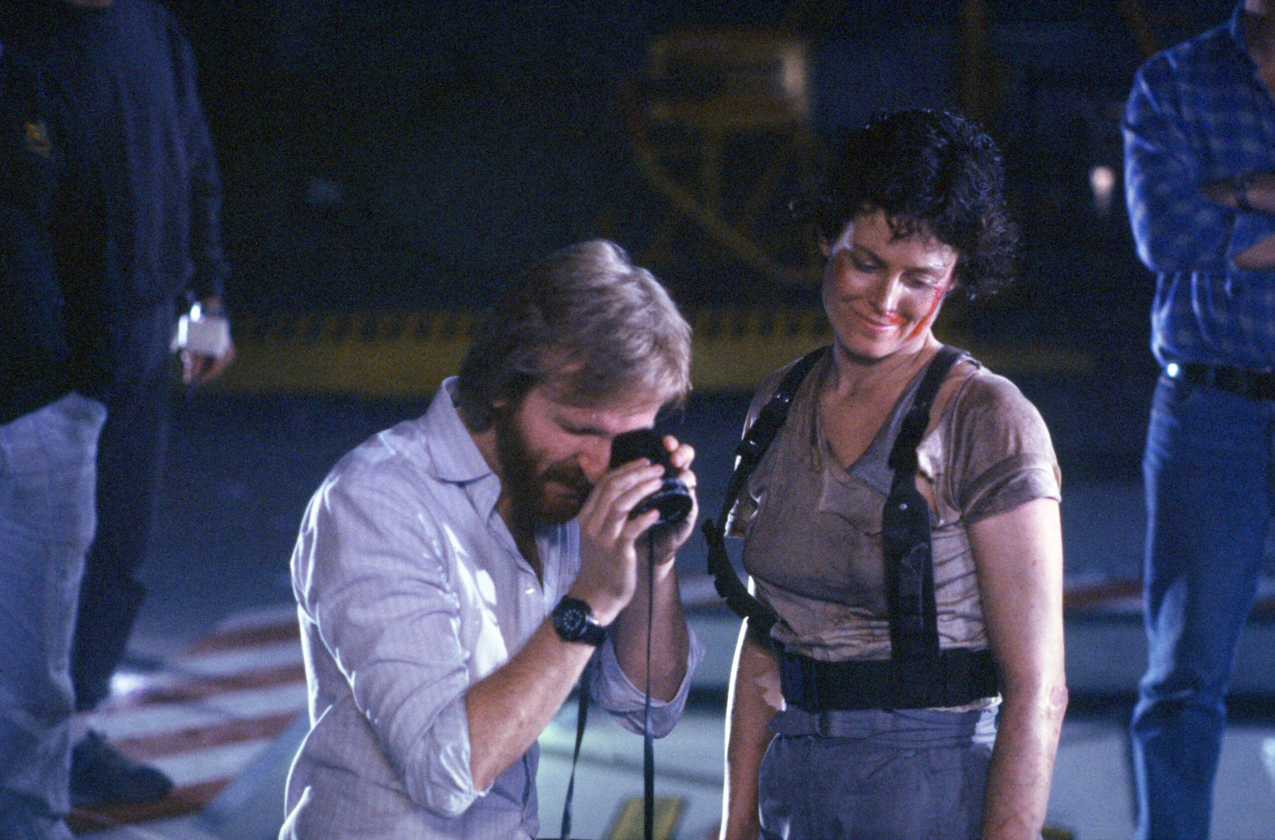 ALIENS, from left: director James Cameron, Sigourney Weaver, on set, 1986,