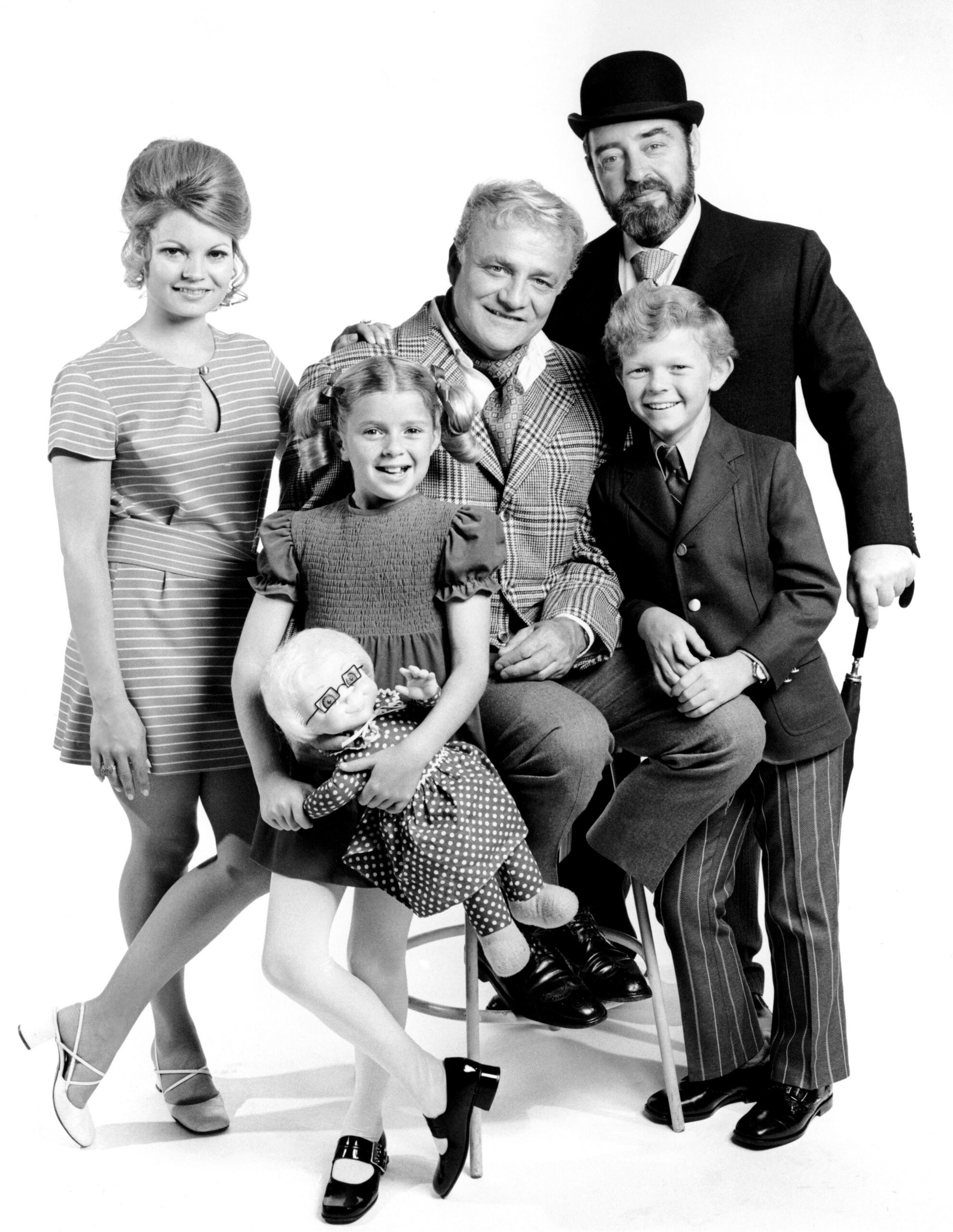 FAMILY AFFAIR, (from left): Kathy Garver, Anissa Jones (holding Mrs. Beasley), Brian Keith, Johnny Whitaker, Sebastian Cabot, 1966-71.