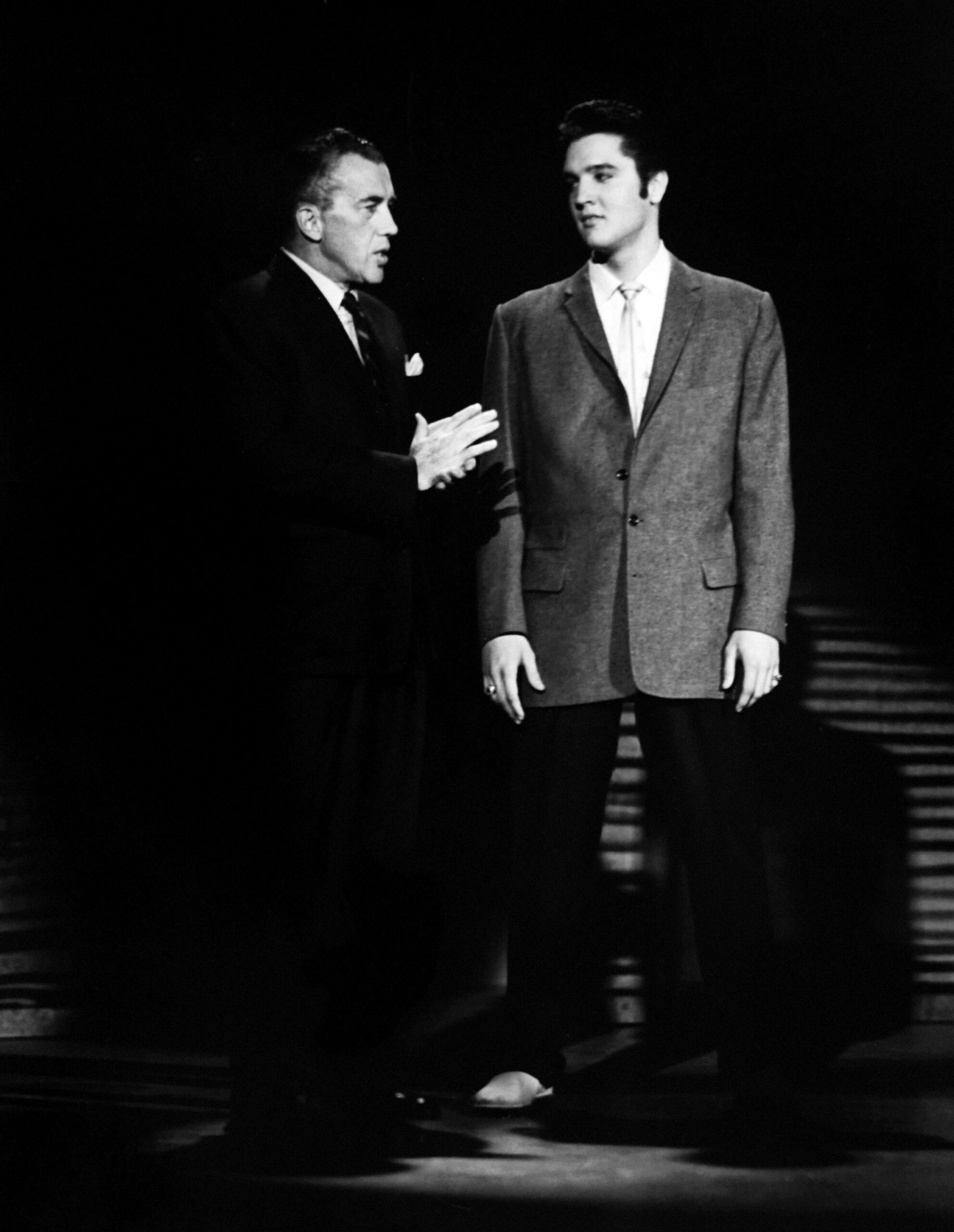 THE ED SULLIVAN SHOW, from left, Ed Sullivan, Elvis Presley, episode aired October 28, 1956