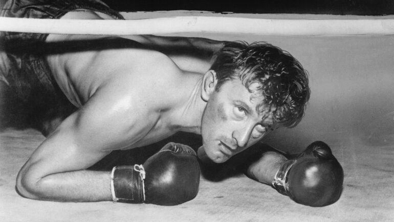(Original Caption) Kirk Douglas is shown in a scene from the movie The Champion, a movie directed by Mark Robson. The boxer character 
