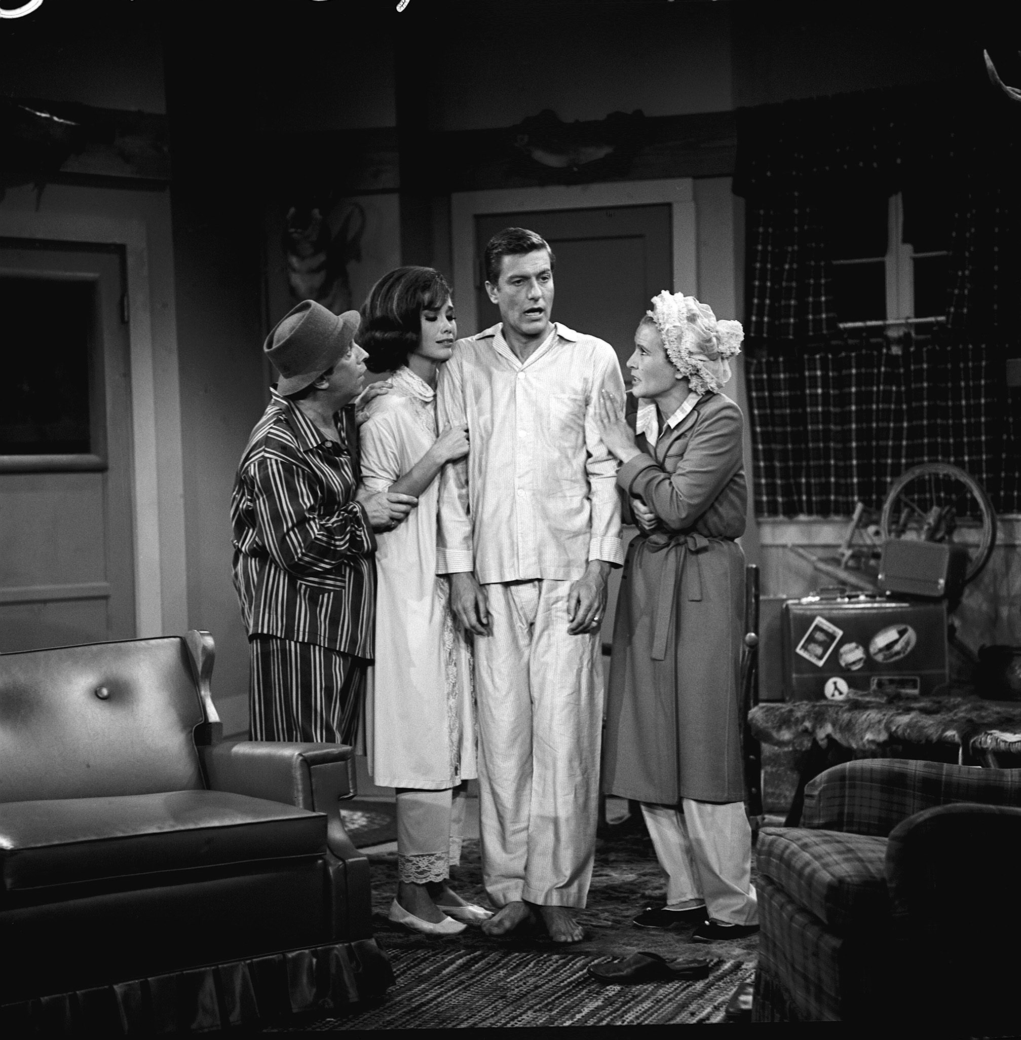 LOS ANGELES - SEPTEMBER 30: THE DICK VAN DYKE SHOW, episode "The Ghost of A. Chantz" broadcast on CBS September 30, 1964. From left: Morey Amsterdam as Buddy Sorrell, Mary Tyler Moore as Laura Petrie, Dick Van Dyke as Rob Petrie, and Rose Marie as Sally Rogers. Image dated August 11, 1964.