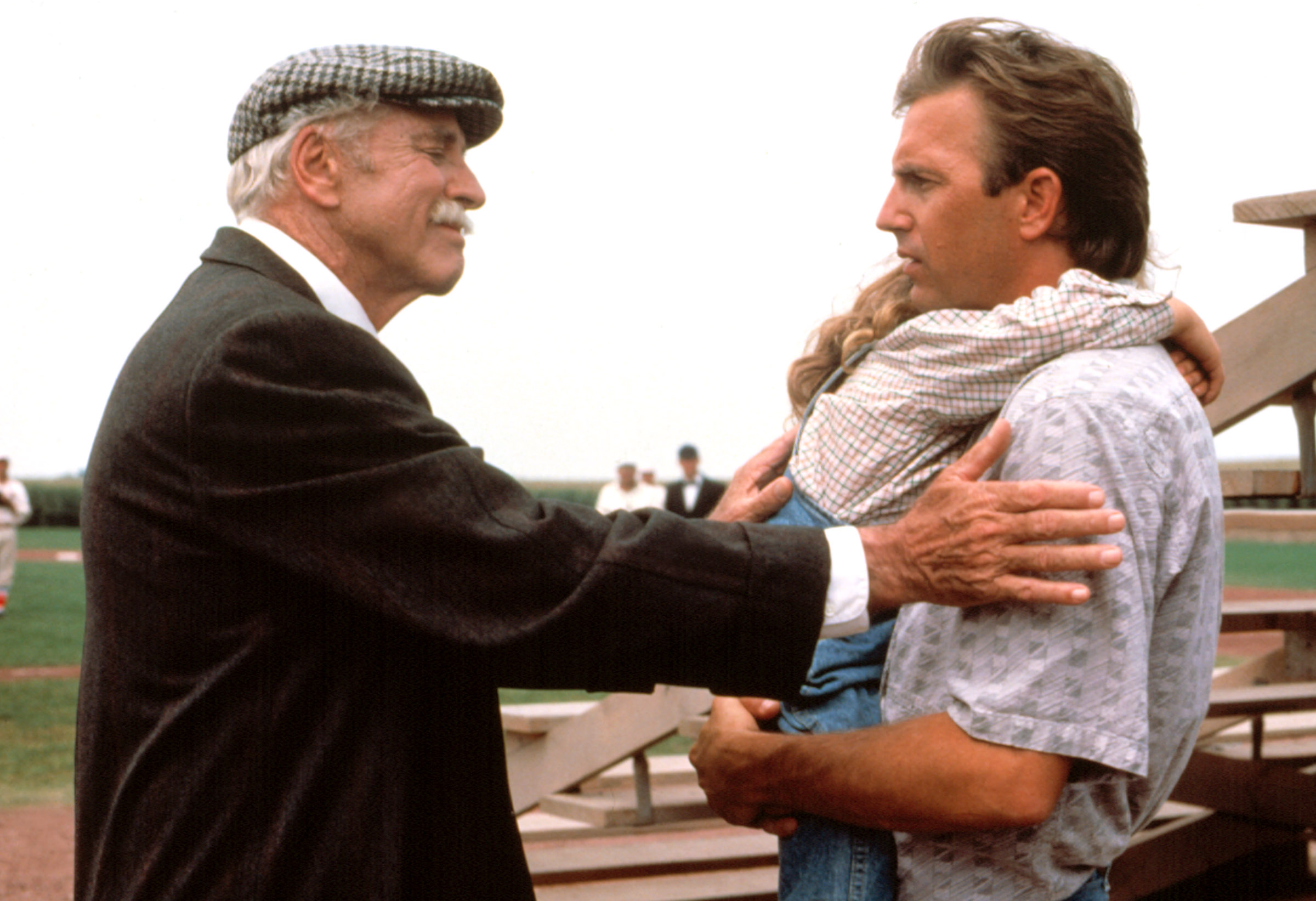 FIELD OF DREAMS, Burt Lancaster, Kevin Costner, 1989, at baseball field