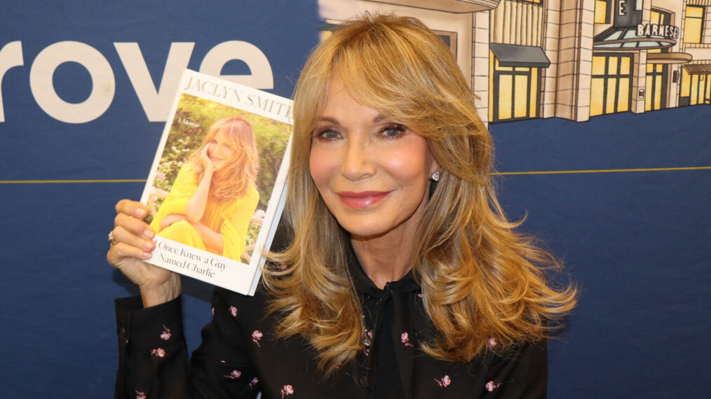 Jaclyn Smith with her book at book signing