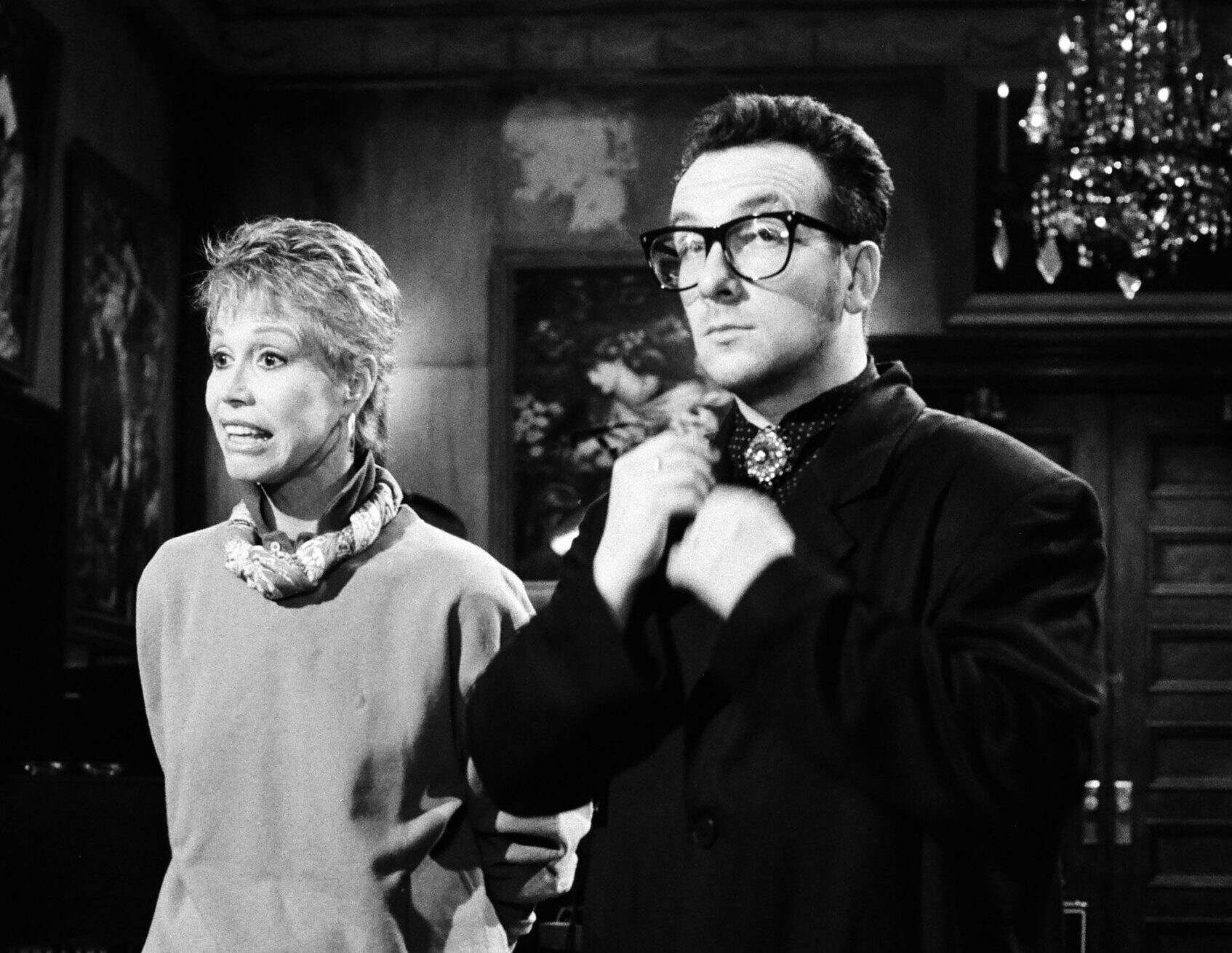 SATURDAY NIGHT LIVE -- Episode 15 -- Pictured: (l-r) Mary Tyler Moore; Elvis Costello during the rehearsal on March 25, 1989