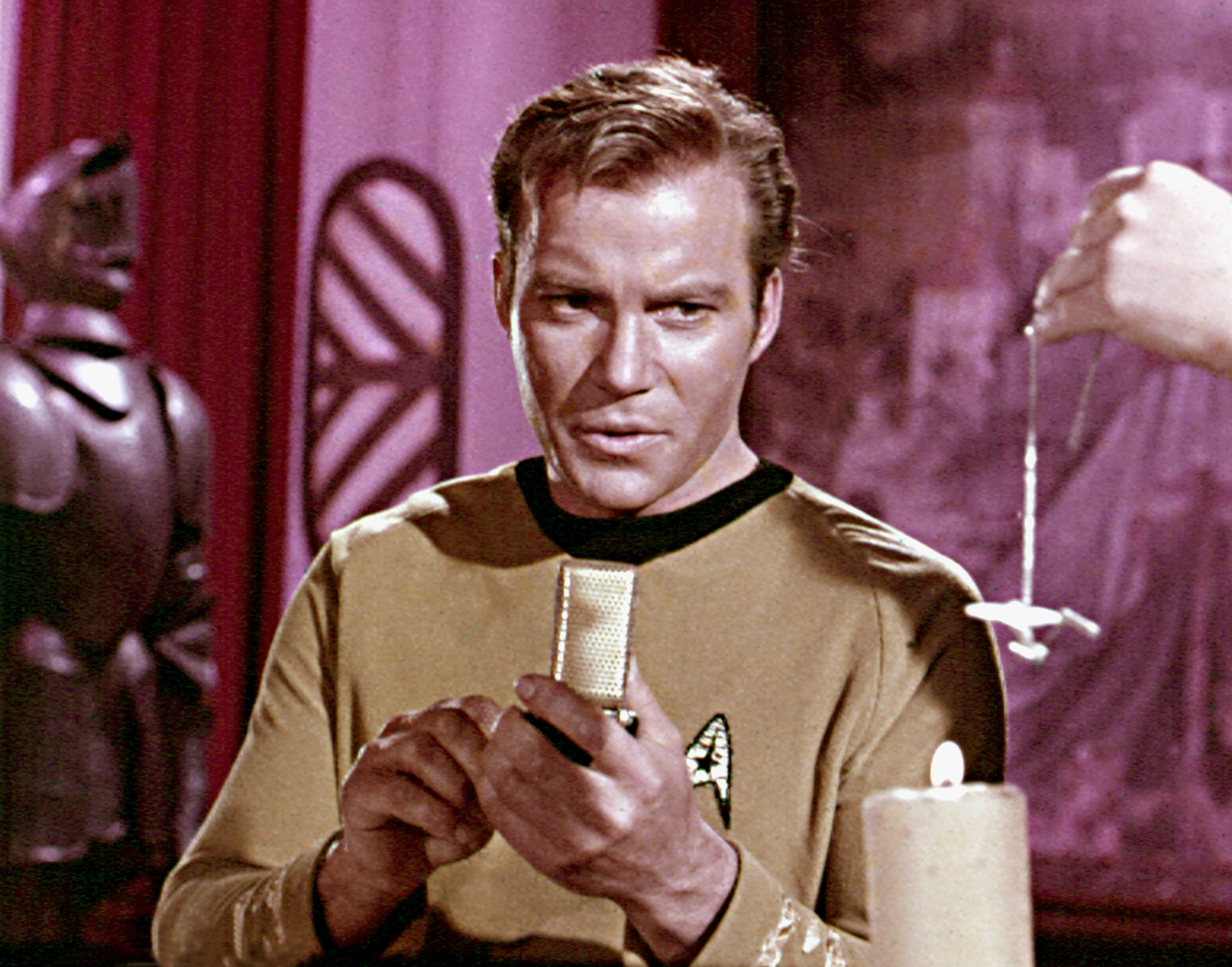 STAR TREK, 1966-69, William Shatner, using a communicator to contact the Enterprise, Episode 'Catspaw', 10/27/67.